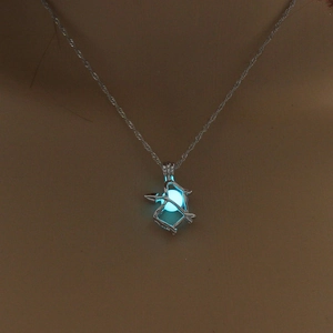 Luminous arrow pendant necklace with glowing blue bead on silver twisted chain