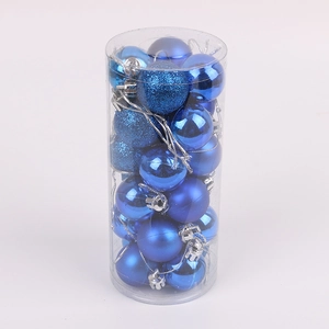 Blue Christmas ball set with mirror matte and glitter textures in cylindrical packaging