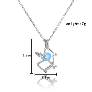Detailed view of silver bow and arrow pendant with dimensions 2.6cm by 1.8cm