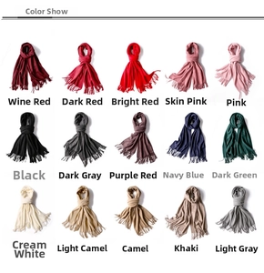 Detailed grid of solid color knit scarves with tassels in 15 different elegant shades
