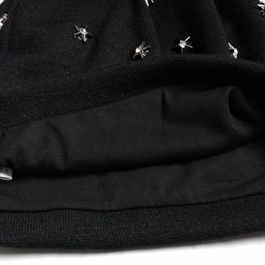 Black knit beanie with silver star studs and warm fabric lining for winter style