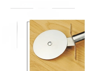 Close-up of food-grade stainless steel pizza cutter wheel and protective finger guard