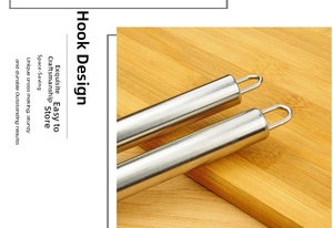 Detail view of stainless steel pizza cutter handle with U-shaped hanging hook for storage