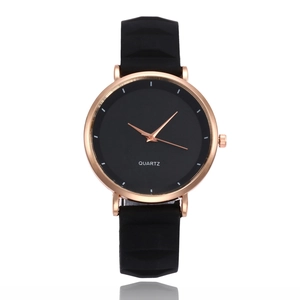 Slim candy color silicone watch with rose gold case and minimalist black quartz dial