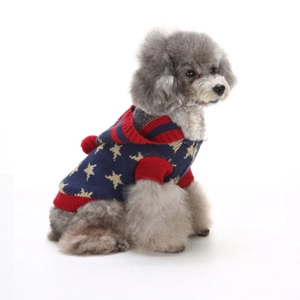 Knitted navy blue dog sweater with yellow stars and red trim for winter warmth