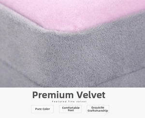Macro shot of fine pink and grey velvet jewelry box showing stitching detail