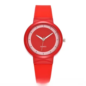 Detailed front view of the minimalist red silicone sports watch with a dual-tone red dial