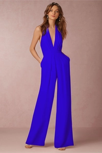 Detail of a bright blue deep V-neck halter jumpsuit with wide legs in lightweight fabric