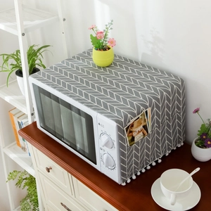 Modern cotton linen microwave dust cover with grey herringbone pattern and side pockets