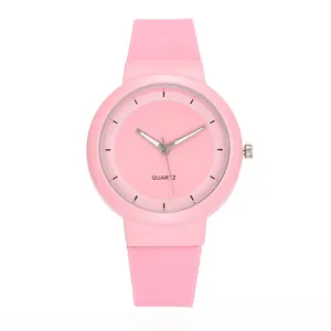 Pink minimalist quartz sports watch with soft silicone strap and clean analog dial