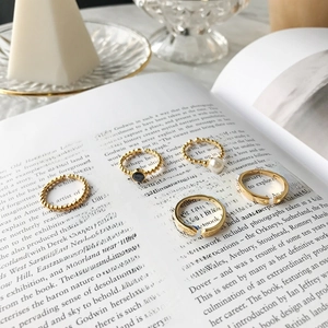 Elegant set of five gold S925 silver adjustable rings with pearls and black zircon stones