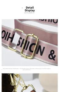 Close-up of adjustable pink shoulder strap with gold metal buckle and brown monogram pattern