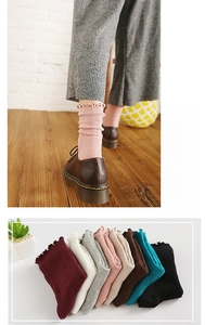 Detail of ruffle trim cotton crew socks in multiple colors with lifestyle scene