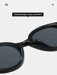 Close-up of the comfortable integrated nose support on black oval sunglasses