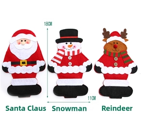 Detail showing Santa, Snowman, and Reindeer felt cutlery holders with 18cm x 11cm dimensions