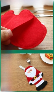 Detailed view of Santa felt cutlery holder for Christmas table setting and party decor