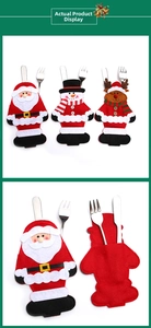 Detail of Christmas cutlery holders showing back pocket for knife and fork storage