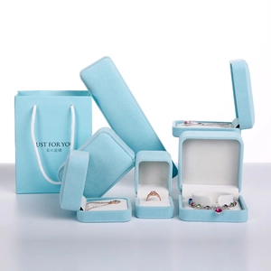 Sky blue velvet jewelry box collection including necklace case and matching gift bag
