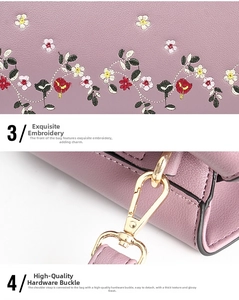 Detail of floral embroidery and gold metal clasp on purple lychee textured handbag
