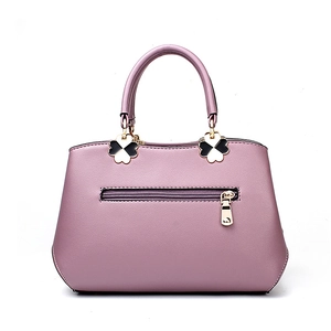 Purple PU leather tote bag with embroidered floral patterns and clover accents