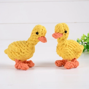 Detailed view of handmade thick cotton rope dog toy in yellow duck shape for pet teething