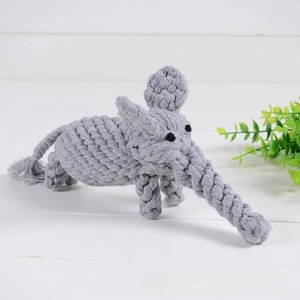 Detailed close-up of handmade gray elephant dog toy with braided cotton rope texture