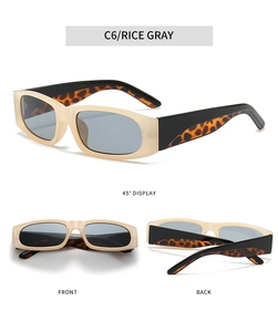 Detail view of rice gray retro rectangular sunglasses with leopard print on the temples