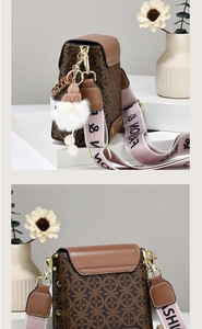 Brown monogram crossbody bag with a stylish wide webbing strap and plush charm detail