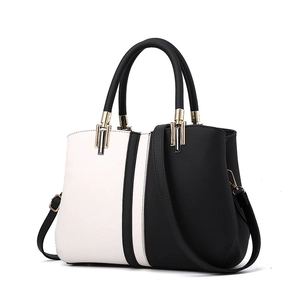Chic black and white contrast leather tote bag with lychee texture and gold hardware