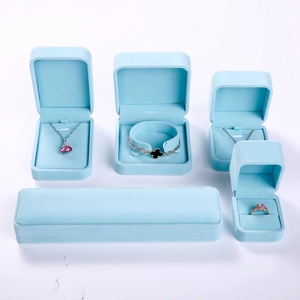 Light blue velvet jewelry gift box set including ring, necklace, and bracelet cases