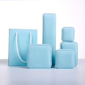 Sky blue velvet jewelry box set with matching paper gift bag for rings and necklaces