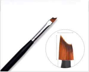 Detail of slanted nail art brush with 0.7cm width and 1cm bristles for French manicure