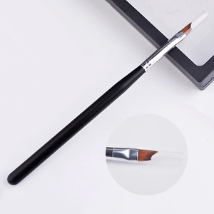 Black handle nail art brush with angled synthetic bristles for French manicure designs