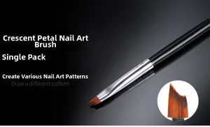 Macro detail of crescent moon petal nail brush with serrated orange synthetic bristles