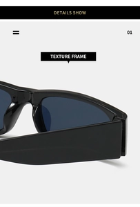 Close-up of high-gloss black frames and wide temple design of trendy sunglasses