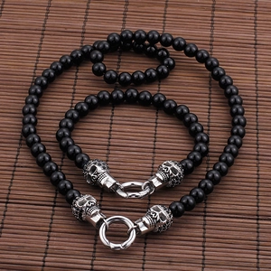 Gothic punk black bead necklace and skull bracelet set in polished silver steel