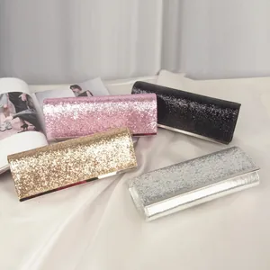 Elegant sequin evening clutches in pink, black, gold, and silver for formal occasions