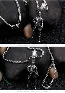 Detailed shot of silver steel soldier pendant with rifle on a twisted rope chain