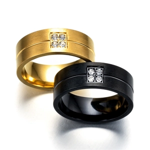 Close-up of matte stainless steel rings with square cubic zirconia inlay detail