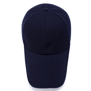 Classic navy blue cotton baseball cap with curved brim and six-panel crown design
