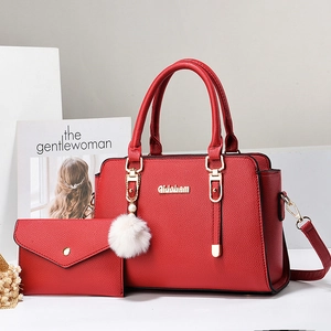 Red large capacity faux leather tote bag set with envelope clutch and pompom charm