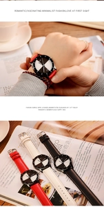 Close-up of stylish minimalist quartz watch with bicolor dial and colorful leather straps