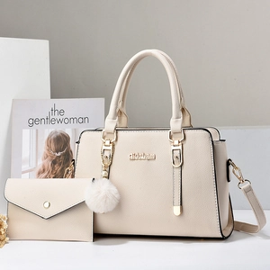 Elegant cream white faux leather tote bag and wallet set with stylish gold hardware