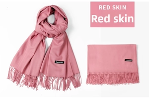 Detail view of pink cashmere scarf with fringe edges and soft brushed texture