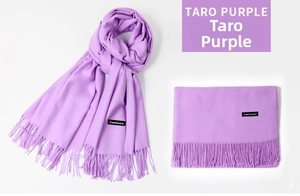 Detail view of taro purple cashmere scarf featuring soft texture and classic long fringes