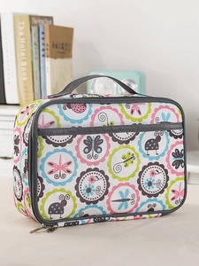 Detail of blue camo oxford insulated lunch bag featuring insect prints and sturdy handle