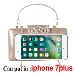Champagne gold evening bag with diamond owl clasp showing interior space for smartphone
