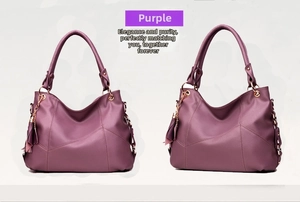 Detailed view of purple tassel handbag showing lychee pattern and rose gold hardware