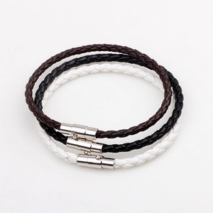Braided leather snake pattern bracelets in brown black and white with silver magnetic clasps