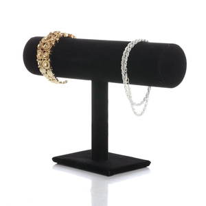 Black velvet T-bar jewelry display stand for bracelets and watches on white background